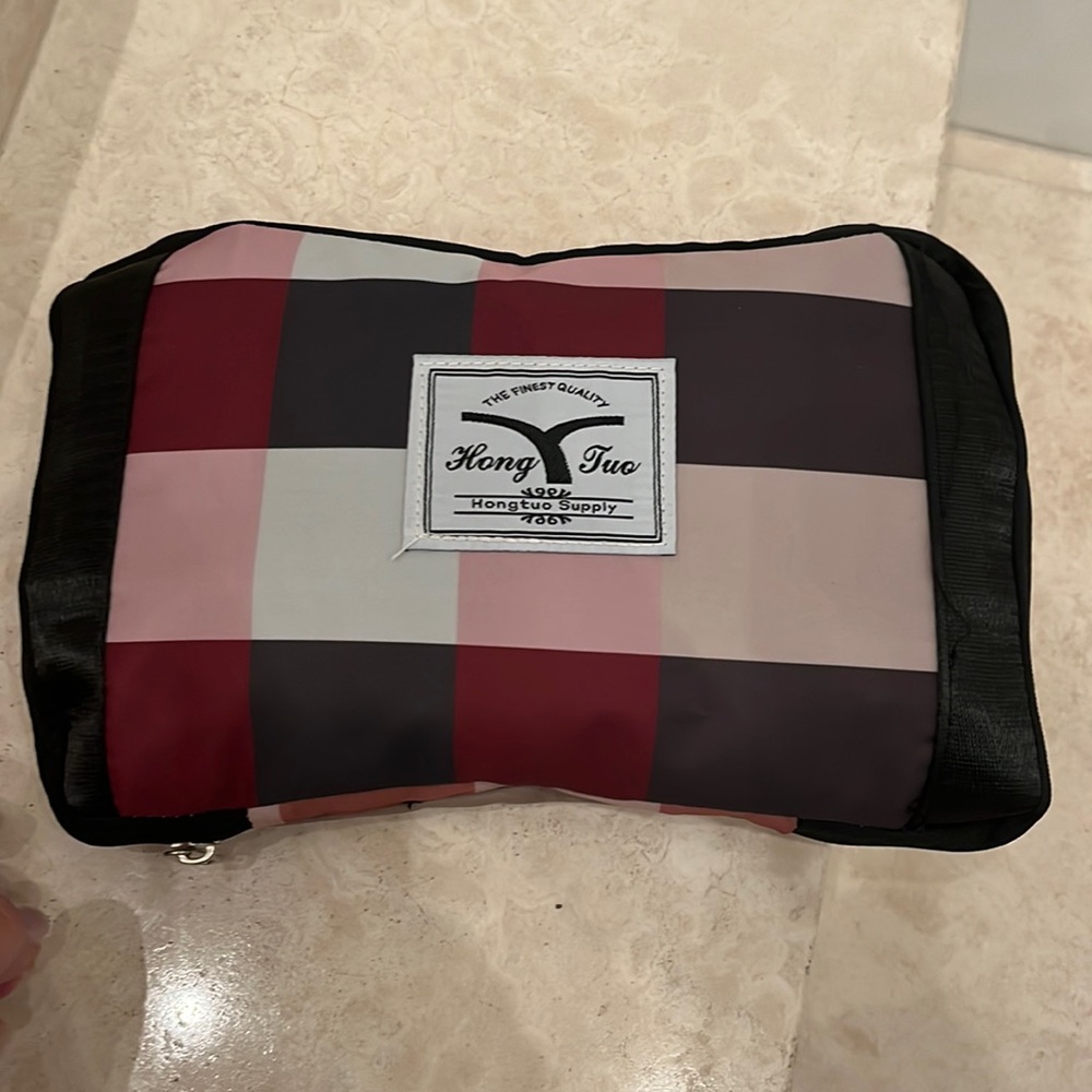 Collapsible travel bag khaki/red/black plaid print